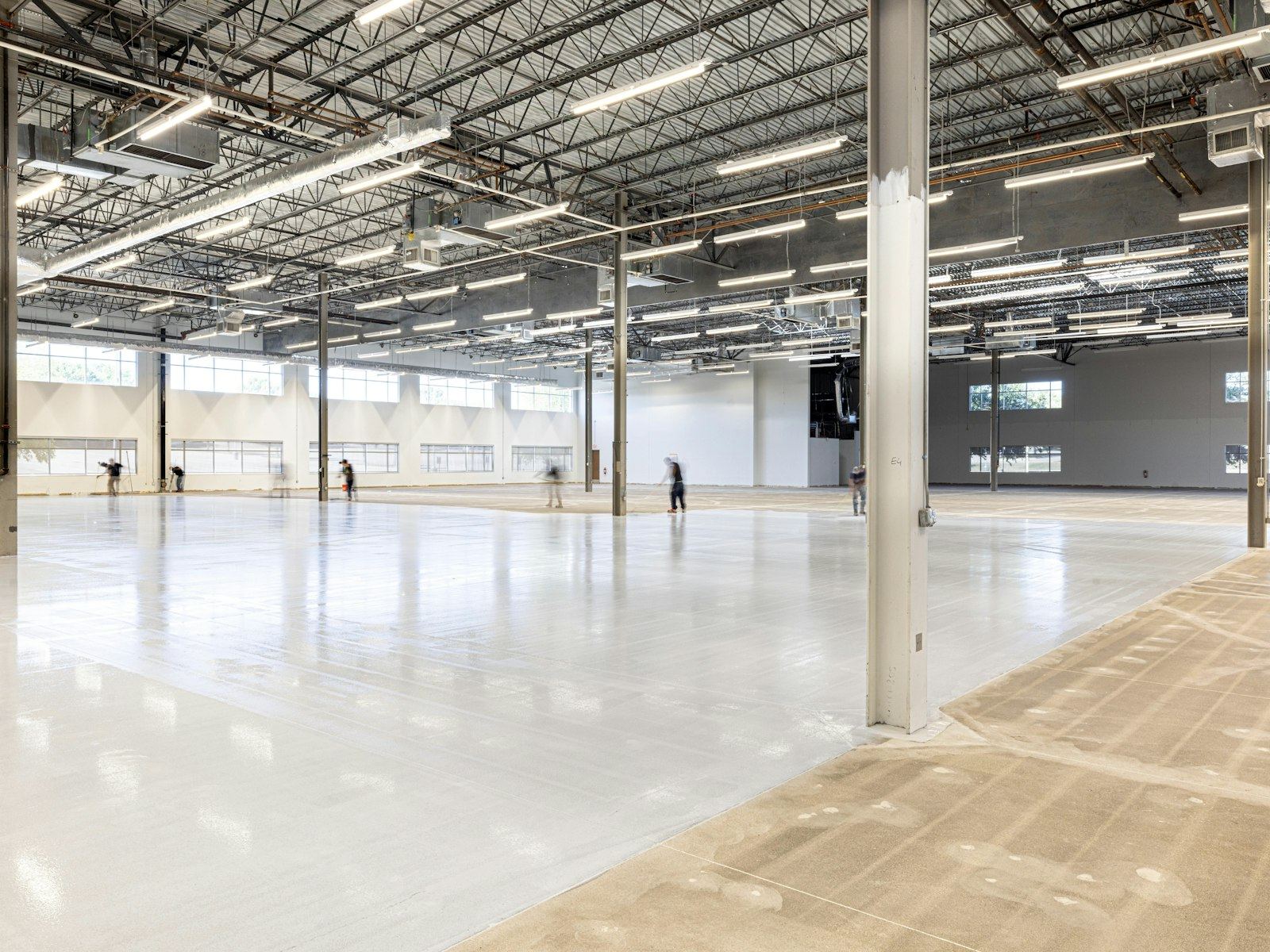 Empty large warehouse with polished concrete floor